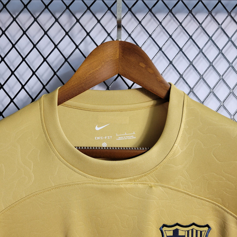 CAMISA DO BARCELONA 22/23 DOURADO